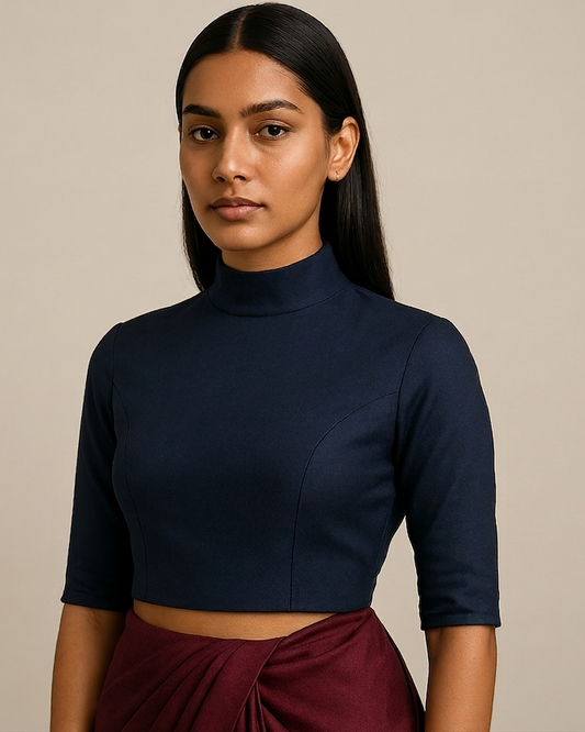 High‑neck blouse with structured neckline, fitted bodice, clean tailoring front view